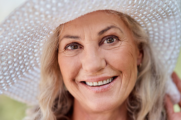 Image showing Let me tell you something about the summer - its awesome. Cropped portrait of an attractive senior woman smiling while standing outdoors on a summers day.