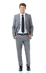 Image showing Hes a young up and comer in the corporate world. A handsome young businessman isolated on white.