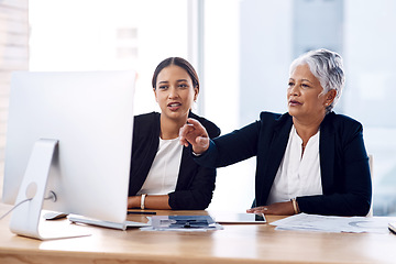 Image showing Mentor, training or business women with computer talking, speaking or planning a project in office. Technology, teamwork collaboration or senior manager explaining to an intern for digital coaching