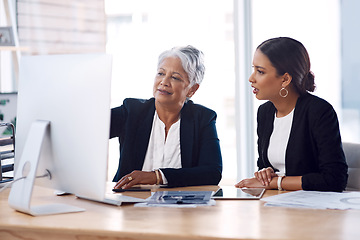 Image showing Mentor, coaching or business women with computer talking, speaking or planning a project in office. Technology, teamwork collaboration or senior manager explaining to an intern for digital training