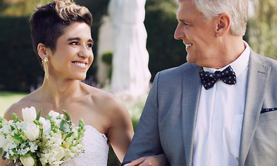 Image showing You deserve this happiness and much more. Cropped shot of an affectionate mature father smiling at his daughter while walking her down the while on her wedding day.