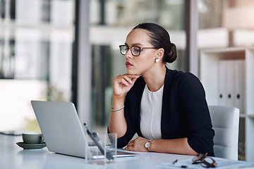 Image showing Keep working hard until you achieve your goals. Cropped shot of an attractive young businesswoman working on a laptop inside her office.