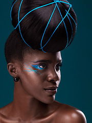 Image showing Idea, fashion and hair care with a model black woman in studio on a blue background for beauty. Thinking, makeup and cosmetics with an attractive young female person at a salon for a trendy hairstyle