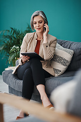 Image showing Run the stats by me again. Cropped shot of an attractive mature businesswoman sitting alone and using technology in her home office.