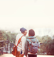 Image showing Young love. Rearview shot of an affectionate young couple on campus.