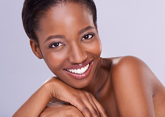 Image showing Taking care of her skin. Cropped shot of an attractive young woman touching her skin.