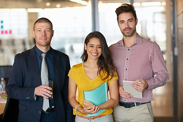 Image showing Teamwork is how well achieve success. Cropped portrait of three businesspeople standing in the office.