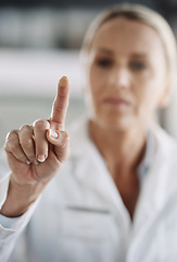 Image showing She pushes all the right buttons. Cropped shot of a mature female scientist working on touchscreen technology while doing research in her lab.