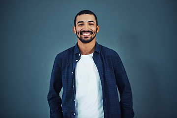 Image showing Be confident in who you are. Studio portrait of a confident man posing against a gray background.