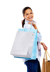 Image showing Woman, smile and shopping in studio, portrait and isolated white background for sales. Happy customer, rich model and retail promotion of commerce market, discount product and luxury store brand deal