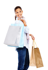 Image showing Woman, shopping bag and thinking in studio, white background and isolated retail product sales. Happy customer, rich model and gift bag for discount mall promotion, luxury store brand and market deal