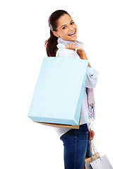 Image showing Happy shopping, woman and studio portrait with white background, isolated and retail mall sales. Rich customer, model and gift bags for shopper service, discount promotion and luxury store brand deal