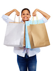 Image showing Shopping bag, woman and smile for studio portrait on white background, isolated and excited gift sales. Happy customer, model and retail shopping from market, discount promotion or luxury store offer