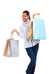 Image showing Happy woman, shopping bag and studio portrait with white background, isolated mockup and mall sales. Rich customer, model and shop in retail market, discount promotion and luxury store brand offer