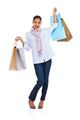 Image showing Excited, woman and retail bags portrait of a model excited after retail, discount and sale deal bag. White background, isolated and happiness of customer shopping with vertical mockup and happy smile