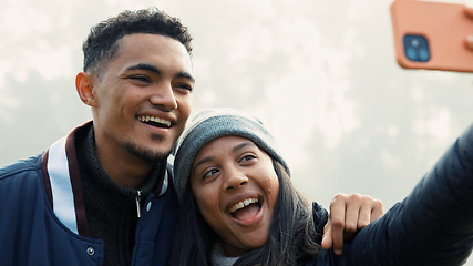 Image showing Selfie, love and a couple hiking in nature together for adventure, fun or to explore the wilderness. Photograph, travel and young people bonding while posing for a profile picture on social media