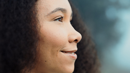 Image showing Face, happy and woman in nature, thinking and vacation in the woods to relax. Ideas, calm and facial closeup of a young girl on a holiday, camping and with confidence on a misty morning with a smile