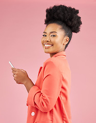 Image showing African woman, studio portrait and phone with texting, web chat or contact with smile by pink background. Young fashion model, student or gen z girl with smartphone, beauty and happy for social media