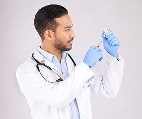 Image showing Monkeypox vaccine, medical injection and doctor with medicine bottle, healthcare safety or immunity in studio. Asian man, hospital worker and needle for virus, vaccination or risk on white background