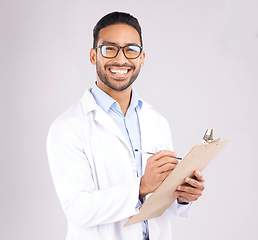 Image showing Happy man, portrait or doctor with clipboard in studio, planning notes or healthcare information. Asian medical worker smile with report of insurance checklist, medicine or script on white background