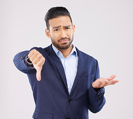 Image showing Studio portrait, thumbs down and business man with negative fail sign, no opinion vote or decision disagreement. Emoji gesture, problem and corporate person with bad feedback news on white background