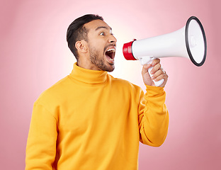 Image showing Man, megaphone and voice for news, broadcast or student sale with wow announcement on studio pink background. Young person or gen z noise with call to action, university attention or college speaker