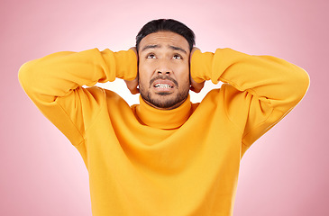 Image showing Headache, stress and asian man in studio with depression, tinnitus or brain fog on pink background. Anxiety, migraine and Japanese guy in crisis, mistake or fail, vertigo or frustrated by noise