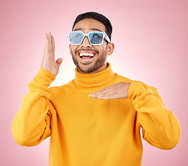 Image showing Man, vogue dance and sunglasses in studio with excited smile, thinking and clothes for aesthetic by pink background. Asian gen z student, happy or color lens for fashion, dancing or ideas for party