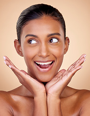 Image showing Thinking, beauty or happy woman with natural facial glow with dermatology skincare cosmetics in studio. Hands, background or face of Indian girl model smiling with health ideas, wellness or self love