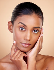 Image showing Portrait, beauty or Indian woman with natural facial glow with dermatology skincare cosmetics in studio. Aesthetic face, brown background or gen z girl model with wellness, shine or self love glow