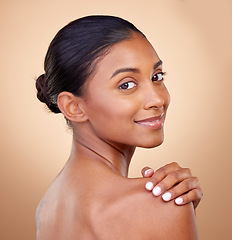 Image showing Portrait, beauty or happy woman with natural facial glow with dermatology skincare cosmetics in studio. Aesthetic face, brown background or gen z girl model with wellness, smile or self love in spa