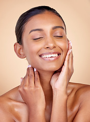 Image showing Face, skincare or happy woman with natural beauty or facial glow with dermatology cosmetics in studio. Eyes closed, relax or beautiful Indian girl model laughing with wellness, smile or self love