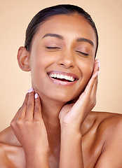 Image showing Skincare, funny and Indian woman with cosmetics, facial and dermatology on a brown studio background. Female person, aesthetic and model with treatment, laughing and shine with self care and wellness