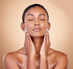 Image showing Skincare, studio face and woman relax with natural foundation makeup, aesthetic cosmetics or self care routine. Spa salon, collagen shine or clean Indian person with facial beauty on brown background