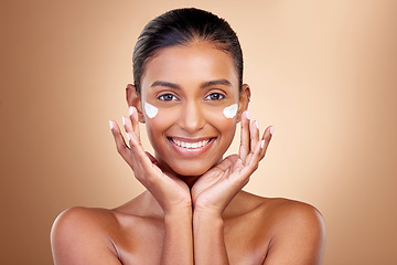 Image showing Facial cream, skincare or portrait of happy woman for aesthetic shine, cosmetics or dermatology on studio background. Indian female model, face lotion or product for healthy beauty, glow or self care