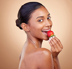 Image showing Eating, strawberry and portrait of woman for skincare, natural beauty or benefits from healthy nutrition, diet and fruit. Girl, food and vitamin c for skin to glow, shine or wellness of body