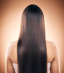 Image showing Back, straight hair and beauty of woman in studio isolated on a brown background. Haircare, natural cosmetics and model with salon treatment for balayage hairstyle, growth and aesthetic for wellness