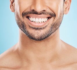 Image showing Smile, teeth whitening and mouth of a man on a studio background for a dentist treatment. Health, wellness and tooth results of a person or model with dental or oral surgery on a backdrop for beauty