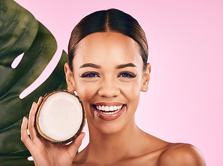 Image showing Fruit, coconut and portrait of woman with skincare, beauty and cosmetics for natural or vegan facial care, dermatology or treatment. Smile, happy and healthy girl with product, cream or moisturizer