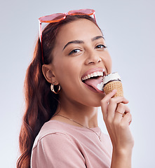 Image showing Summer, ice cream and portrait of woman with smile in studio with dessert, snack and sweet treats. Happy, sunglasses and face of female person with cone in trendy accessories, style and cosmetics