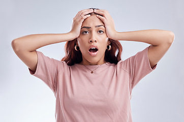 Image showing Mistake, wow and young woman in studio with hand on head for anxiety, stress or panic. Portrait of a shocked female model person on a white background with gossip, bad news and problem or fail