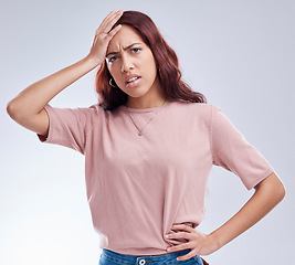 Image showing Regret, mistake and young woman in studio with hand on head for anxiety, stress or panic. Portrait of a frustrated female model person on a white background with doubt, stress and problem or fail