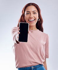 Image showing Woman in portrait, phone screen with mockup and advertising, mobile app ads on white background. Website promo, logo design marketing and female brand ambassador with social media branding in studio