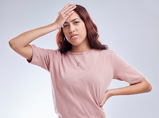 Image showing Mistake, regret and young woman in studio with hand on head for anxiety, stress or panic. Portrait of a female model person on a white background with doubt, negative mindset and problem or fail