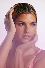 Image showing Beauty, cosmetic and beautiful woman in studio with a natural, glamour and luxury face routine. Makeup, attractive and female model from Australia with facial cosmetology isolated by pink background.