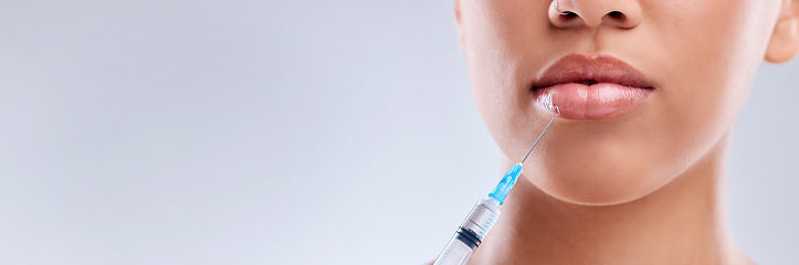 Image showing Lip filler, injection and beauty banner, woman and cosmetic surgery and dermatology on white background. Face, skincare and syringe, female model and mockup space with liquid collagen in studio