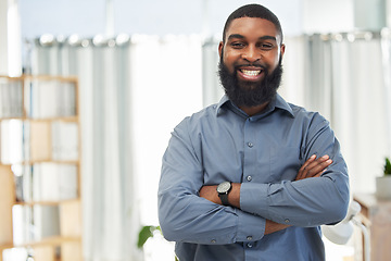 Image showing Happy, portrait and a black man with arms crossed in an office for corporate and management business. Smile, working and an African accountant with pride and confidence in job and a finance company