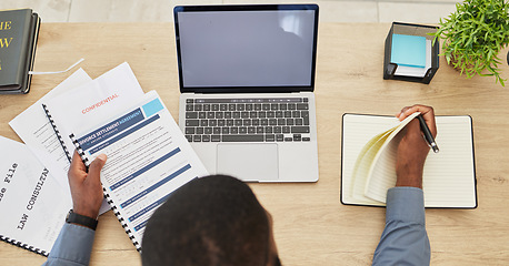 Image showing Legal documents, lawyer and top view of desk, laptop mockup with contract and deal agreement. Documents, technology and notebook, person at law firm and workspace, website on screen and notary report