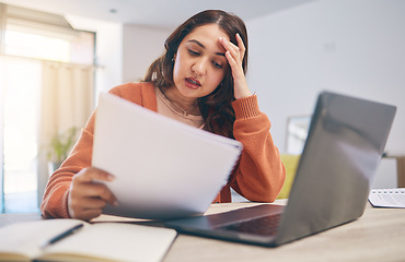 Image showing Documents, stress and woman on laptop in home with paperwork for online banking, finance and taxes. Remote work, worry and female person with computer for debt payment, financial report and bills