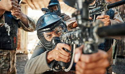 Image showing Paintball game, gun and man aim, shooting focus and target soldier, warrior or training for battlefield fight conflict. Army mission, military teamwork and team point weapon in war, action or battle